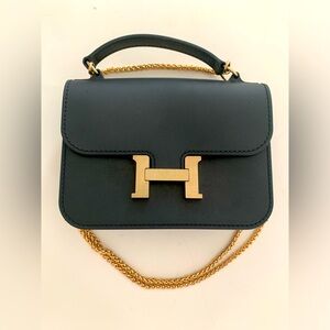Fashion Inspired Black Designer Handbag with Gold Accents
